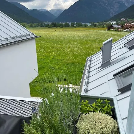 Urban Alpine Penthouse With View
