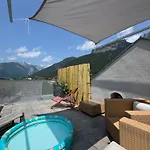 Modern Alpine Penthouse With Lake View